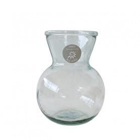 Vase en verre contenant fleuriste