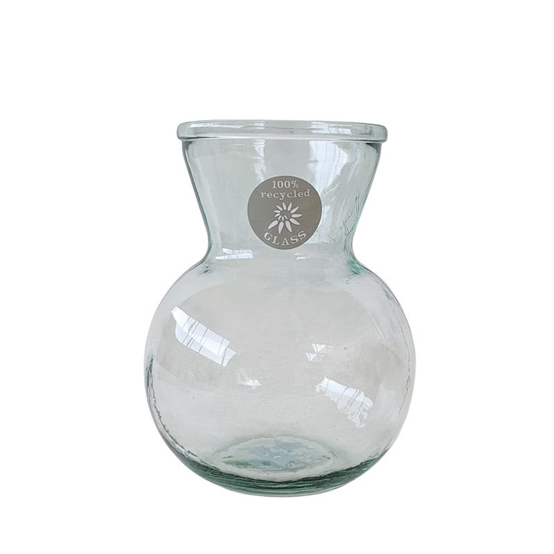 Vase en verre contenant fleuriste